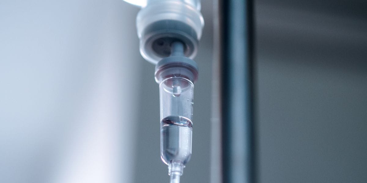 A syringe with a needle attached, commonly used for injections or drawing fluids.